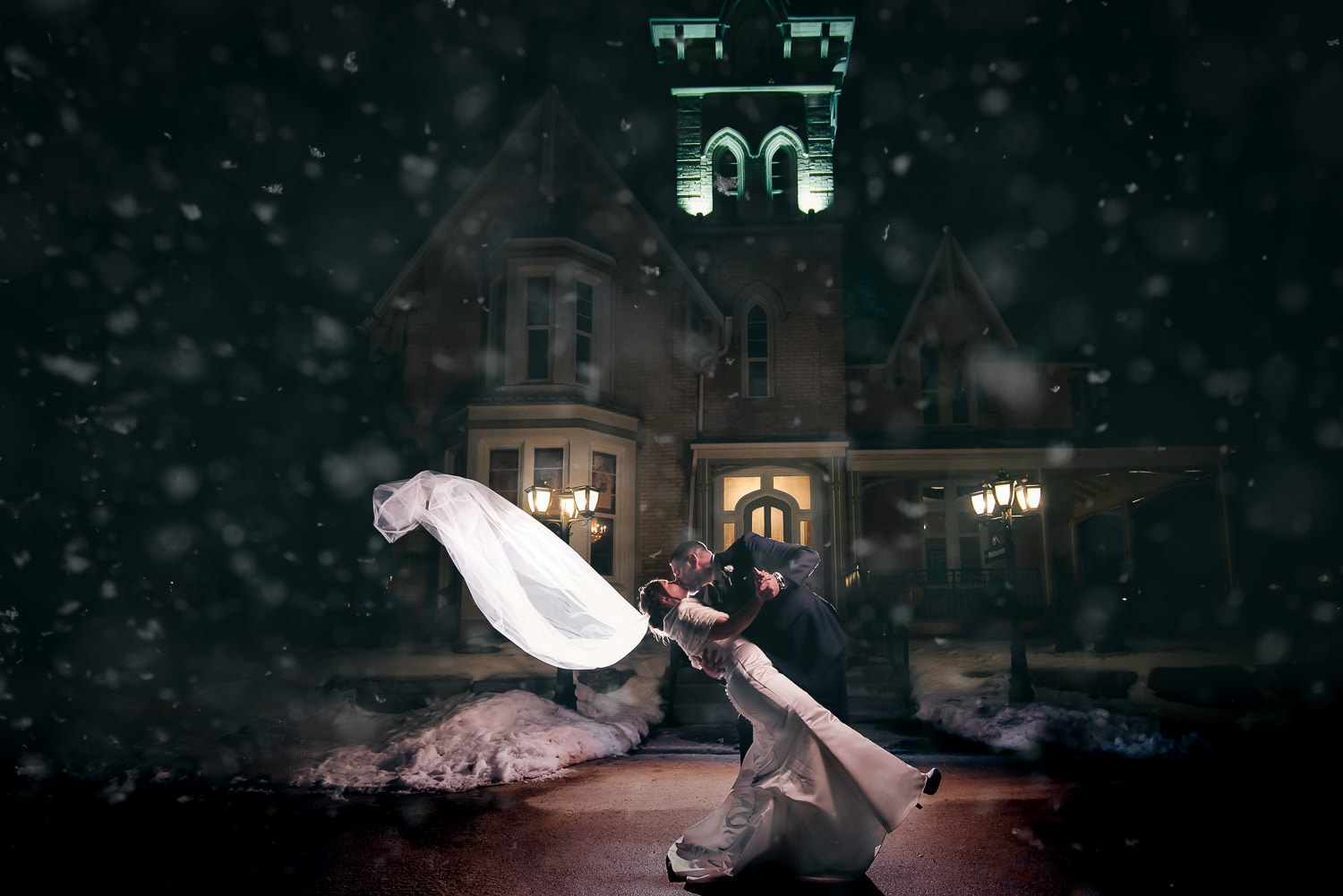 beautiful nighttime winter wedding photo at elmhurst inn